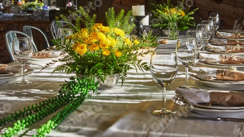 Preview: Laid table with cutlery and crockery in the sunset sunlight