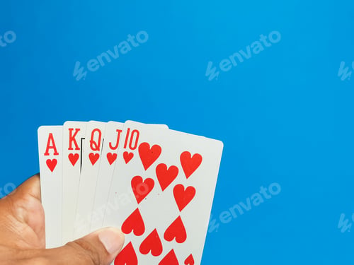 Preview: Hand hold card games against blue background. Poker games and gambling concept.
