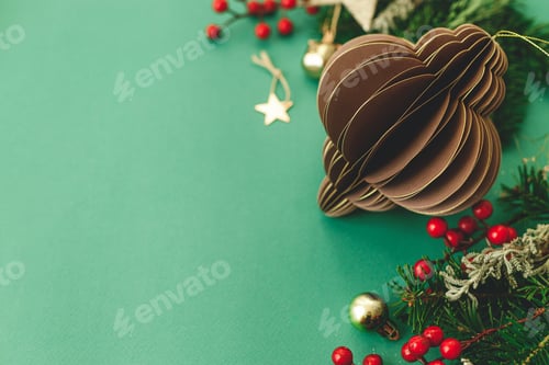 Preview: Merry Christmas! Stylish Christmas paper bauble, fir branches, red berries and gold ornaments
