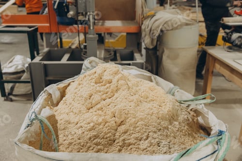 Preview: Sawdust filling big bag in carpentry workshop for modular building industry
