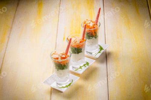 Preview: finger food with ricotta arugula carrot and sliced almond