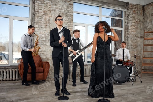 Preview: Young international musicians, a band performing on the loft stage. The concept of music, hobby