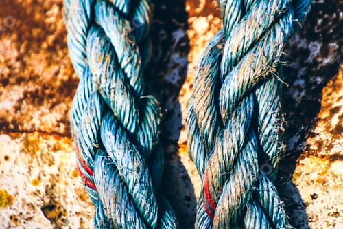 Preview: Blue thick rope on the rusty surface