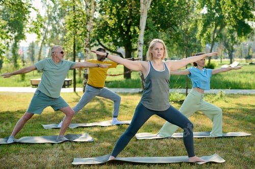 Preview: Female yoga instructor showing exercise