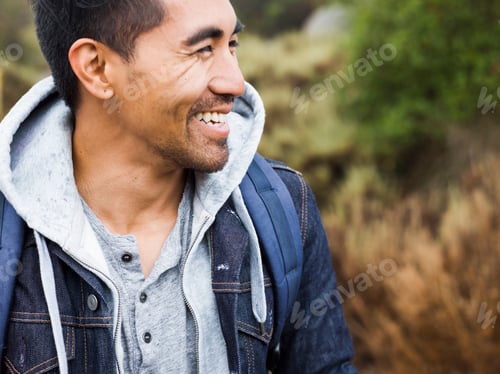Preview: A young man smiling.