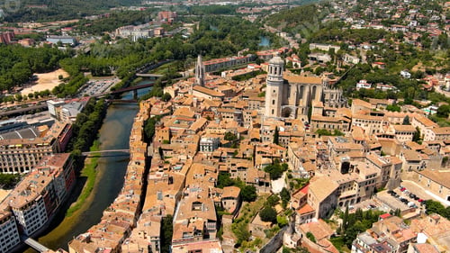 Preview: Aerial view of Girona and Church of Sant Feliu and Saint Mary Cathedral in a beautiful summer day