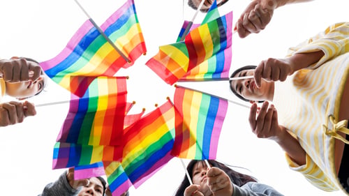 Preview: LGBTQ Rainbow Flags being waved symbol of Diversity Gay and lesbian for Celebration gay pride parade