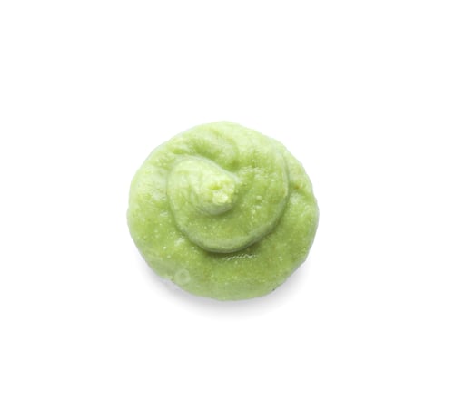 Preview: Swirl of delicious spicy wasabi paste isolated on white, top view