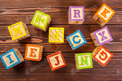 Preview: wooden block alphabet lay on wooden floor