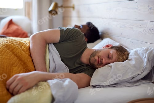 Preview: Loving Male Gay Couple Sleeping In Bed At Home Together