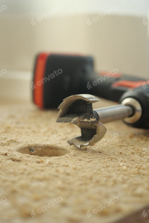 Preview: Close-up view of woodworking tool and drill in action