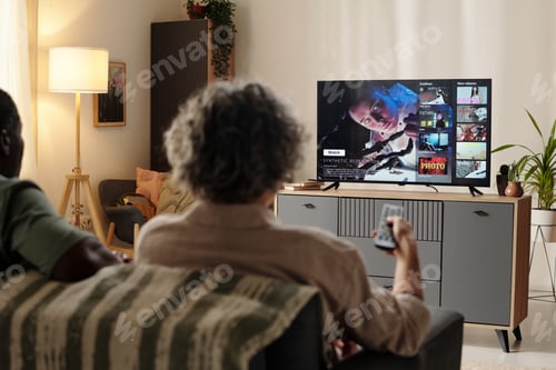 Preview: Watching Movie While Sitting in Modern Living Room
