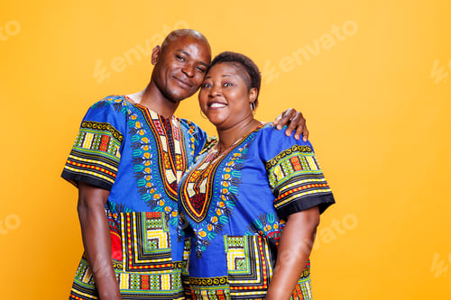 Preview: Smiling black couple embracing portrait