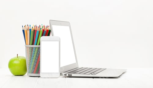 Preview: Workplace with laptop, smartphone, supplies