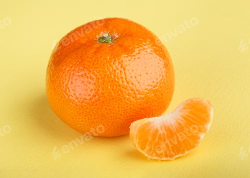 Preview: Ripe Mandarin Close-Up On A White Background. Tangerine Orange. Colorful Food And Drink Still Life