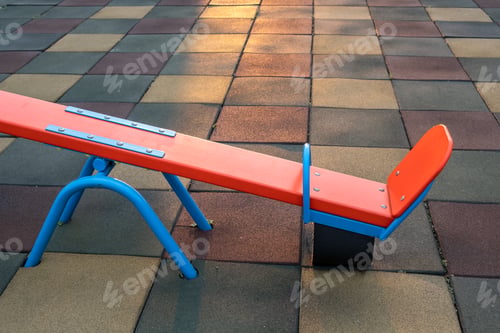 Preview: Rubber coating and flip flap swing at the playground at preschool.