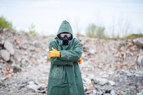 Preview: A man in a protective mask and protective clothing explores the danger zone. Ecological catastrophe