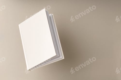 Preview: Blank notepad on beige background studio shot