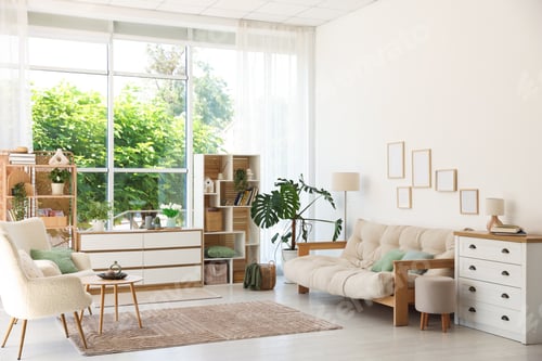 Preview: Stylish sofa and other furniture in living room. Interior design