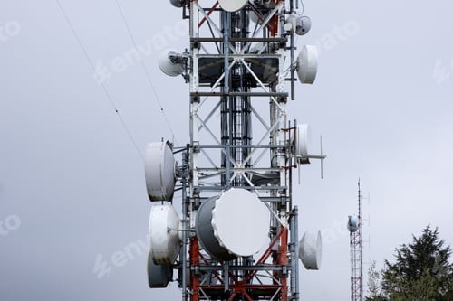 Preview: The tower stands tall with numerous antennas attached to it, serving as a hub for communication sign