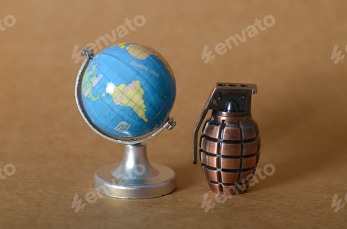 Preview: World on the Edge: A Globe and Grenade Depicting Global Tension and Fragility of Peace