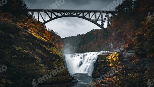 Preview: River flow and fall with vibrant color in a cloudy day during autumn season