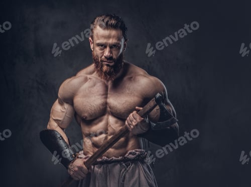 Preview: A man holds axe over dark grey background.