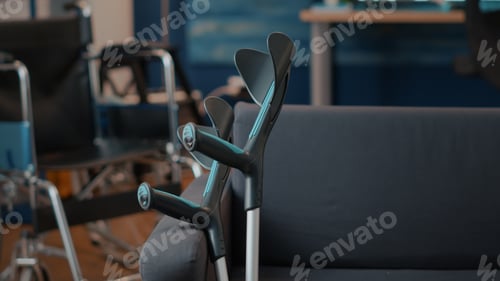 Preview: Crutches on empty couch in living room to give mobility support