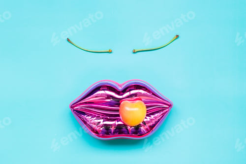 Preview: NOMINATED!! a woman's face created from shining lips and cherry twigs