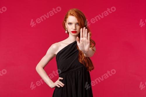 Preview: Fashion, luxury and beauty concept. Portrait of serious-looking confident redhead woman in elegant