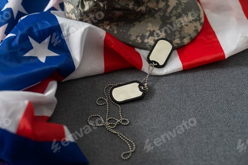 Preview: Army tokens on American national flag background.