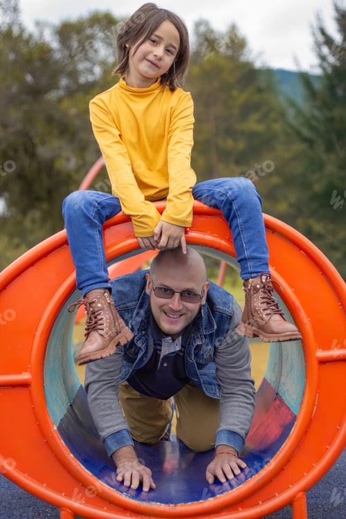 Preview: father-and-daughter-in-the-playground