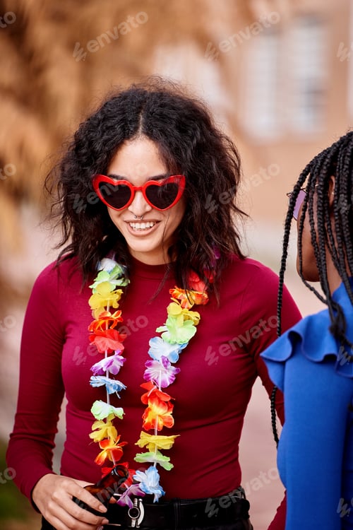 Preview: Happy woman having fun while partying with her friends.
