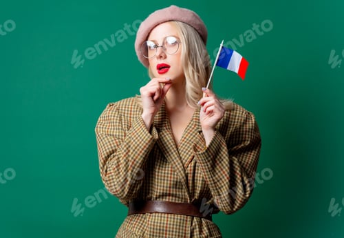 Preview: beautiful woman in style jacket and hat with French flag