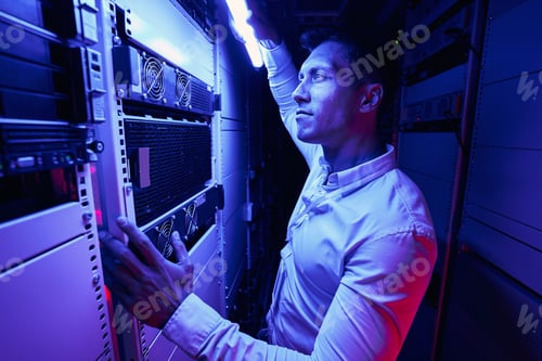 Preview: Experienced serious system administrator monitoring network server