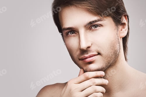 Preview: Young handsome man with a stubble beard