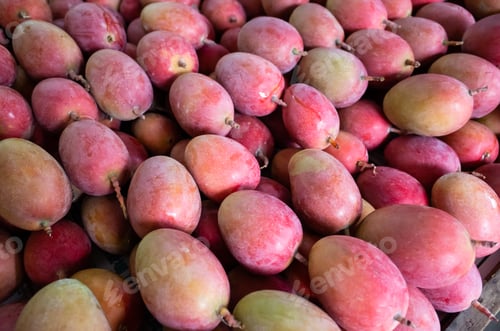 Preview: Stacks Of Mango Fruits In Vivid Red Color At Traditional Marketplace, Taiwan