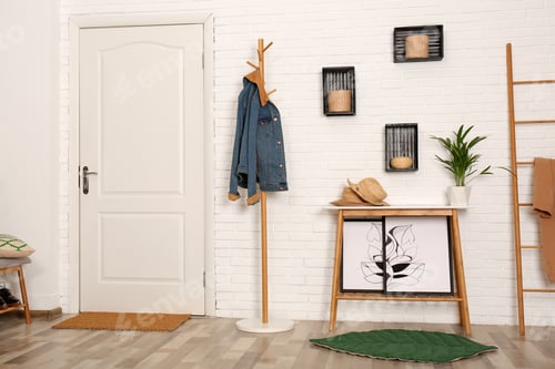 Preview: Stylish hallway interior with hanger stand and table