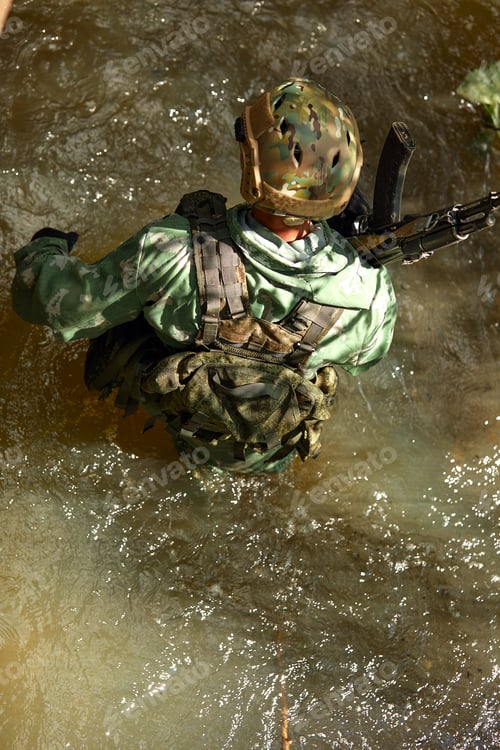 Preview: Full military experience - One day commando - running through the water with automatic rifle replica