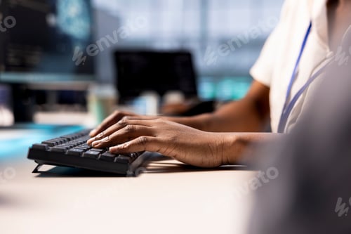 Preview: Close up of data center cybersecurity expert typing on keyboard