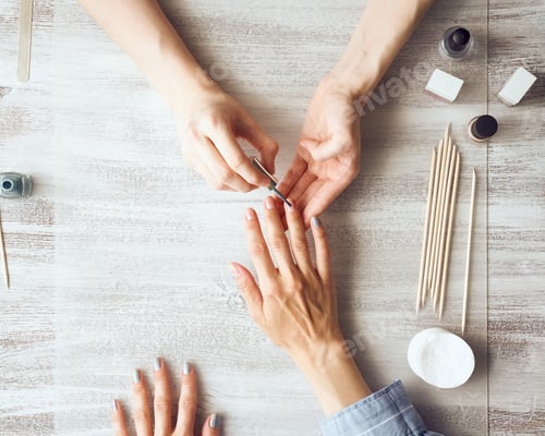Preview: Hands Applying Nail Polish to Fingers
