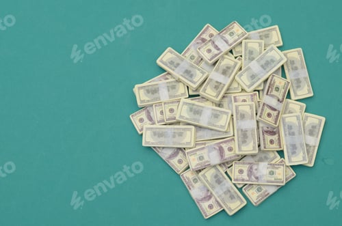 Preview: Concept of Wealth, Riches, and Success with Stacked Cash Bundles