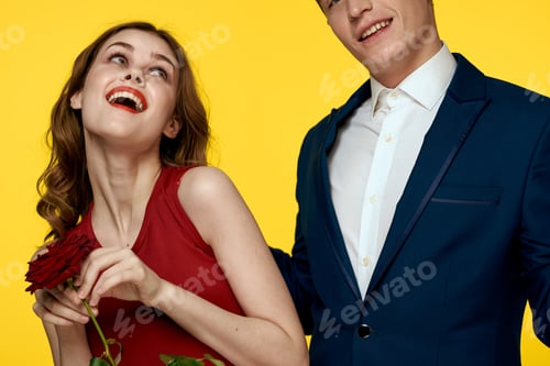 Preview: Cheerful man and woman date communication luxury roses fun