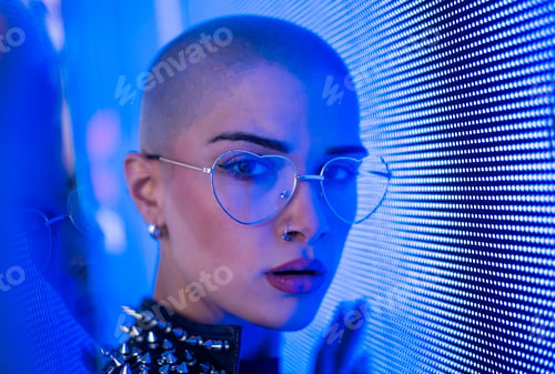 Preview: Beautiful woman illuminated by led lights