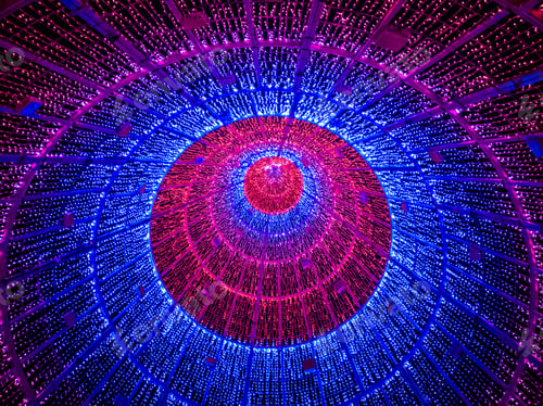 Preview: Vibrant array of lights arranged in a circular pattern on a dark background