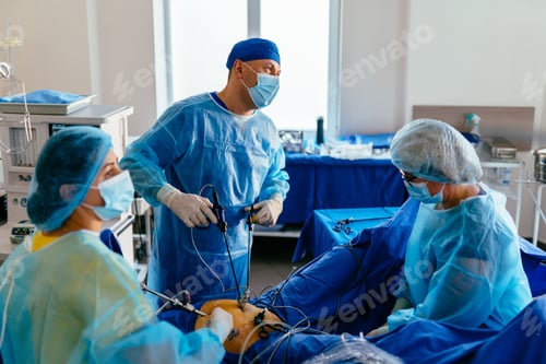 Preview: Surgeons Performing Laparoscopic Surgery in Hospital Room