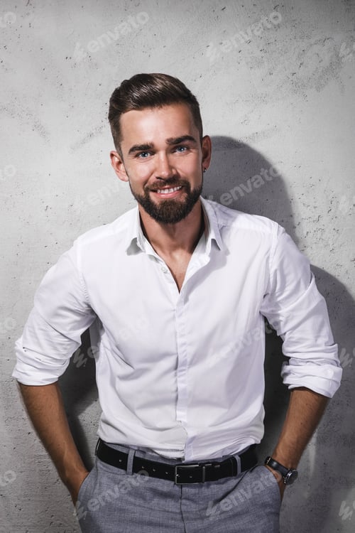 Preview: Handsome and bearded man wearing white shirt