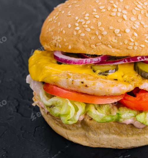 Preview: Chicken burger on black stone table