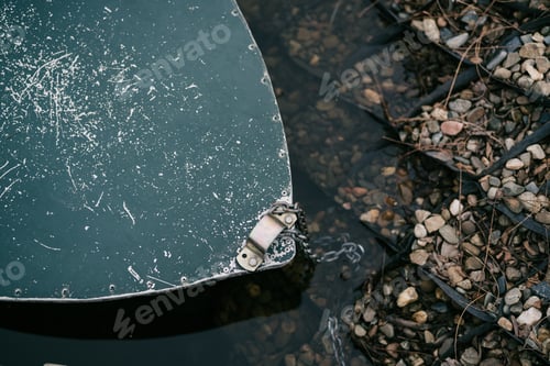 Preview: old wooden boat in the river near the pier nature landscape