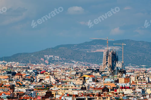 Preview: Aerial view of Barcelona city with famous Sagrada Familia basilica under construction
